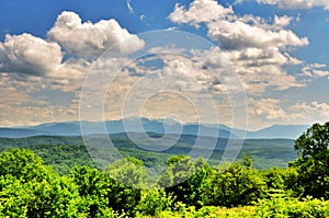 Beautiful lansdcape with blue cloudy sky in Caucasus mountains