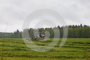 Beautiful lansdscape with haymaking