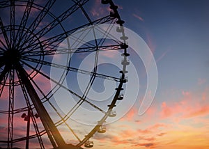 Beautiful large Ferris wheel at sunset