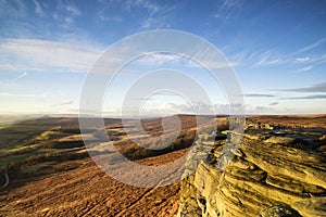 Beautiful late evening Autumn light over Stanage Edge Peak District