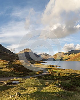 Beautiful late Summer landscape image of Wasdale Valley in Lake District, looking towards Scafell Pike, Great Gable and Kirk Fell