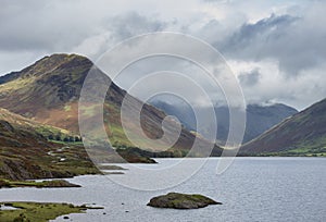 Beautiful late Summer landscape image of Wasdale Valley in Lake District, looking towards Scafell Pike, Great Gable and Kirk Fell