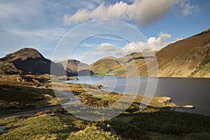 Beautiful late Summer landscape image of Wasdale Valley in Lake District, looking towards Scafell Pike, Great Gable and Kirk Fell