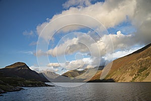 Beautiful late Summer landscape image of Wasdale Valley in Lake District, looking towards Scafell Pike, Great Gable and Kirk Fell