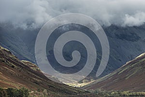 Beautiful late Summer landscape image of Wasdale Valley in Lake District, looking towards Scafell Pike, Great Gable and Kirk Fell