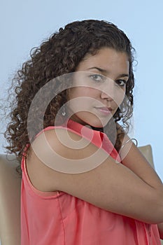 Beautiful latin girl with curly hair