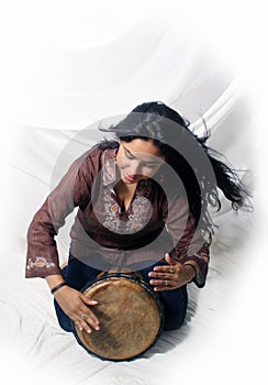 Beautiful Latina playing a Djembe Drum (3)