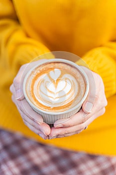 beautiful Latte art coffee with hot milk