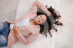 Beautiful, Laughing Biracial High School Senior with Curly Hair and Perfect Smile