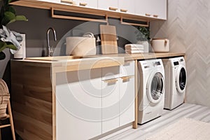 Beautiful laundry room design with modern washer and dryer set