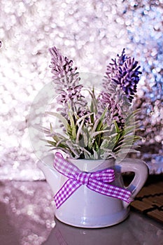 Beautiful lavender in a decorative porcelain pot. Provence, rustic style.