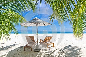 Beautiful leisure lifestyle beach. Idyllic carefree chairs umbrella tropical beach landscape for background or wallpaper