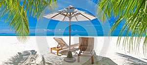 Beautiful leisure lifestyle beach. Idyllic carefree chairs umbrella tropical beach landscape for background or wallpaper