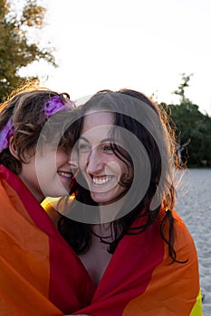 Beautiful lesbian couple hugging tenderly