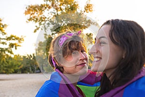 Beautiful lesbian couple hugging tenderly