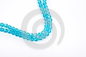 Beautiful Light Blue Glass Sparkle Crystal Isoalted Beads on white background. Use for diy jewelry