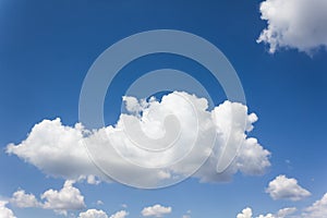 Beautiful light blue sky with puffy white clouds