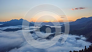 Beautiful light of sunrise sky in wild misty nature with wave of low clouds in Nong khiaw mountains valley,Laos.Hyper lapse 4k