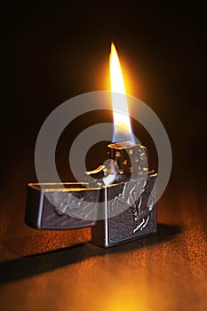 Beautiful lighter on a wooden floor photo