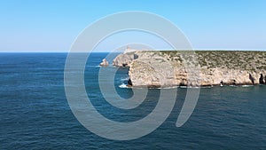 Beautiful lighthouse located on high cliffs of cape in Sagres, Portugal