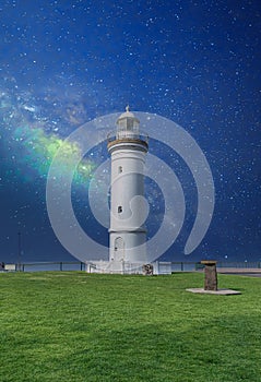 Beautiful lighthouse at Sunset over the Pacific Ocean on cliffs of Kiama Sydney NSW Australia Coastal Beach fishing Town