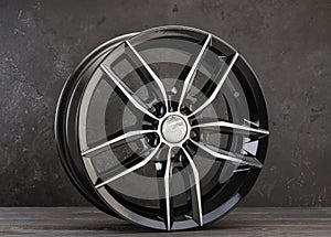 Beautiful lightweight new alloy wheel, black with polishing. auto parts and design.