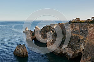 Beautiful limestone rocks in the Atlantic Ocean. Algarve littoral, Portugal