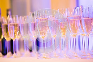 Beautiful line of different colored alcohol cocktails with smoke on a Christmas party, tequila, martini, vodka, and others on part