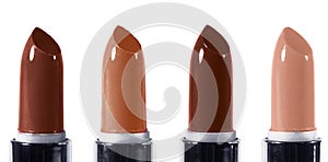 Beautiful lip makeup set. Horizontal macro shot with bright lipticks. Fashion lips make-up collection