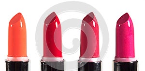 Beautiful lip makeup set. Horizontal macro shot with bright lipticks. Fashion lips make-up collection. Hot visage backround with r