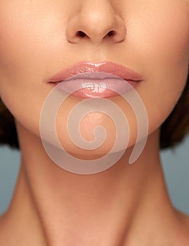 Beautiful lips Close-up Makeup Sexy lips Part of face close up. perfect plump lips bodily lipstick Perfect makeup.