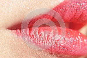 Beautiful lips. pink big lips - close-up. Close-up perfect natural lip makeup beautiful female mouth. Plump full lips.