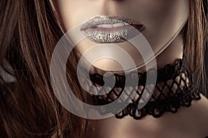 Beautiful lips young girl with fashion choker