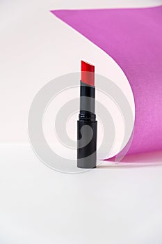 Beautiful lipstick on white background. Professional makeup product.