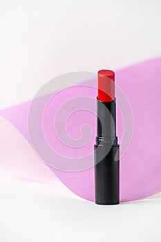 Beautiful lipstick on white background. Professional makeup product.