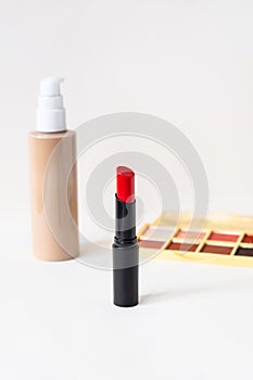 Beautiful lipstick on white background. Professional makeup product.