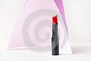 Beautiful lipstick on white background. Professional makeup product.