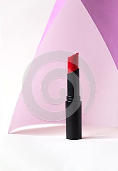 Beautiful lipstick on white background. Professional makeup product.