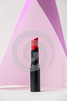 Beautiful lipstick on white background. Professional makeup product.