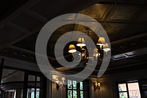 Beautiful lit chandeliers of the vintage restaurant in Rabat, Marocco