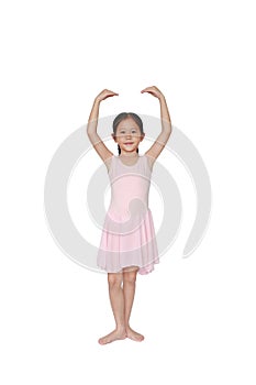 Beautiful little Asian child girl in pink tutu skirt isolated on white background. Children is studying ballet