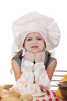Beautiful little baby dressed as a cook