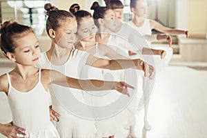 Beautiful little ballet dancers in a row