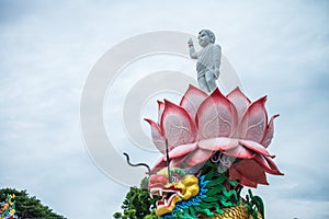 Beautiful little buddha on lotus and dragon in Chinese temple, Kanchanaburi