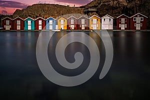 Beautiful little colorful fishermen's houses at the harbor. Typical Swedish houses, VÃ¤stra GÃ¶taland County, Smogen, Sweden