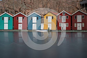 Beautiful little colorful fishermen's houses at the harbor. Typical Swedish houses, VÃ¤stra GÃ¶taland County, Smogen, Sweden