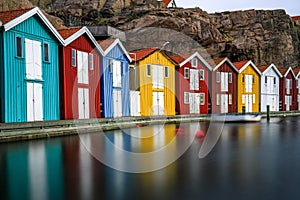 Beautiful little colorful fishermen's houses at the harbor. Typical Swedish houses, VÃ¤stra GÃ¶taland County, Smogen, Sweden