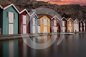 Beautiful little colorful fishermen's houses at the harbor. Typical Swedish houses, VÃ¤stra GÃ¶taland County, Smogen, Sweden