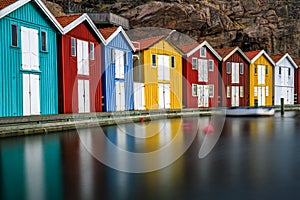 Beautiful little colorful fishermen's houses at the harbor. Typical Swedish houses, VÃ¤stra GÃ¶taland County, Smogen, Sweden