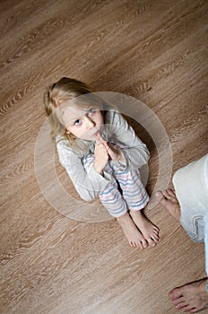 Beautiful little girl asks for forgiveness
